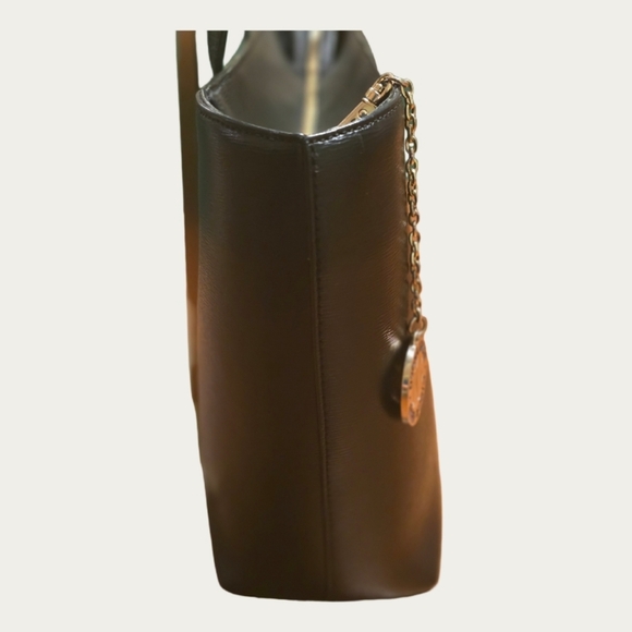 DKNY Bryant Medium Zippered Tote Bag in black leather with gold-tone hardware.  - Picture 6 of 17